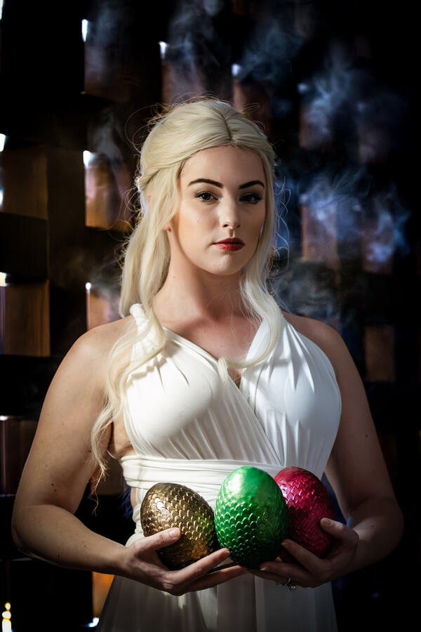 Styled Shoot - Daenerys Targaryen cosplay holding dragon eggs with smoke behind