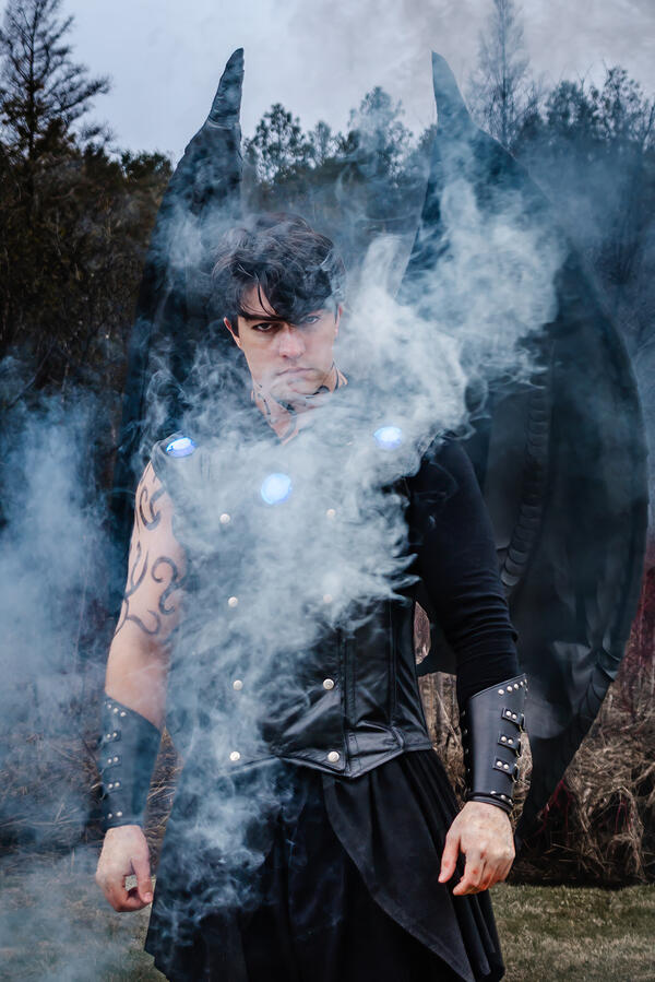 Untitled Styled Shoot - Azriel Cosplay standing in smokey shadows
